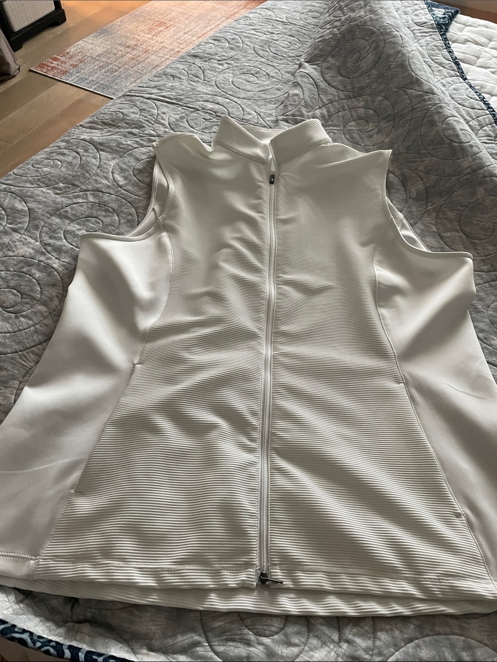 White athletic style vest